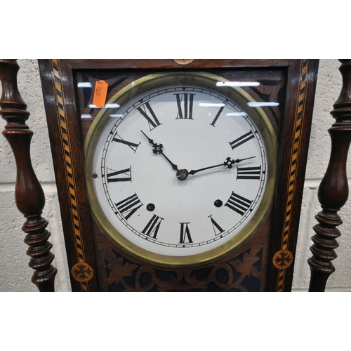 1301 - A 19TH CENTURY ROSEWOOD AND MARQUETRY INLAID WALL CLOCK, with turned spindles, flanking a glazed doo... 