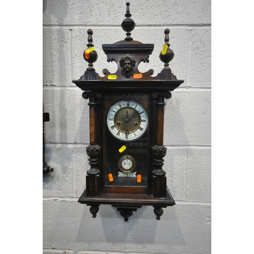 1301 - A 19TH CENTURY ROSEWOOD AND MARQUETRY INLAID WALL CLOCK, with turned spindles, flanking a glazed doo... 