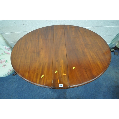 1307 - A 19TH CENTURY OVAL SUTHERLAND TABLE, raised on turned legs, shaped feet and brass castors, open wid... 