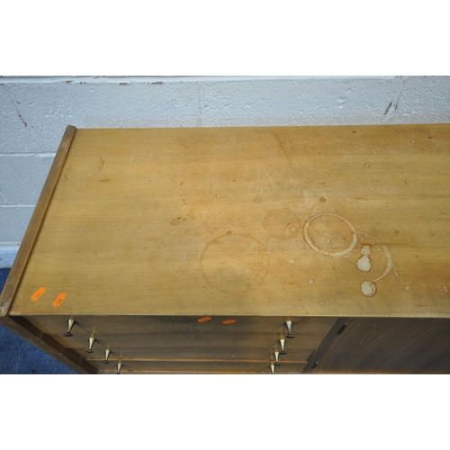 1309 - A MID CENTURY YOUNGER TEAK SIDEBOARD, fitted with four drawers, double cupboard doors, on square tap... 