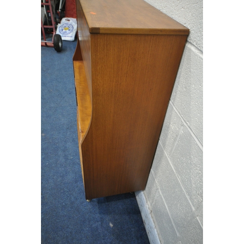 1312 - A JENTIQUE MID-CENTURY TEAK BUREAU, the fall front door enclosing a fitted interior, above a cupboar... 