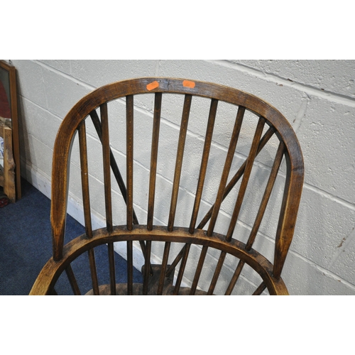 1323 - A NEAR PAIR OF 19TH CENTURY ELM FARMHOUSE STYLE WINDSOR ARMCHAIRS, with spindle back, turned support... 