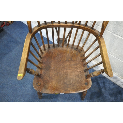 1323 - A NEAR PAIR OF 19TH CENTURY ELM FARMHOUSE STYLE WINDSOR ARMCHAIRS, with spindle back, turned support... 