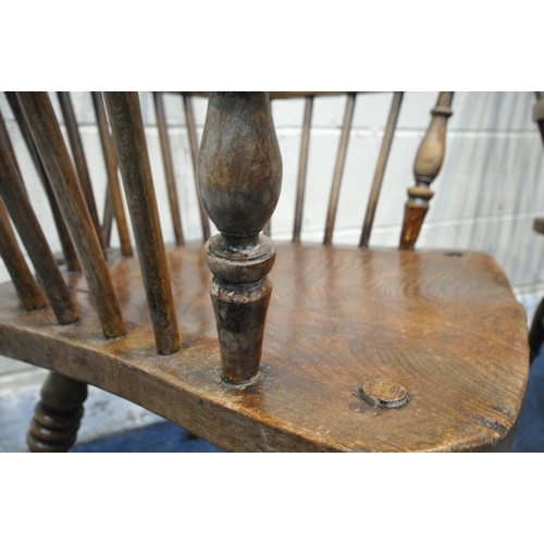 1323 - A NEAR PAIR OF 19TH CENTURY ELM FARMHOUSE STYLE WINDSOR ARMCHAIRS, with spindle back, turned support... 