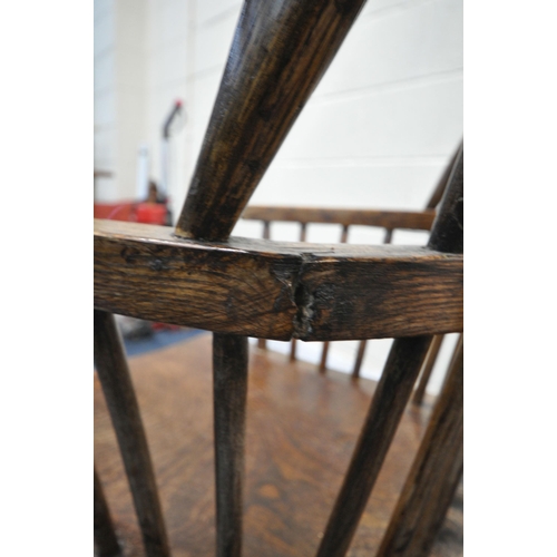 1323 - A NEAR PAIR OF 19TH CENTURY ELM FARMHOUSE STYLE WINDSOR ARMCHAIRS, with spindle back, turned support... 