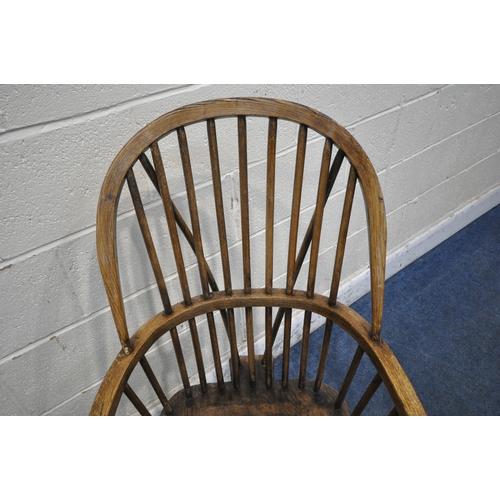 1324 - A NEAR PAIR OF 19TH CENTURY ELM FARMHOUSE STYLE WINDSOR ARMCHAIRS, with spindle back, turned support... 