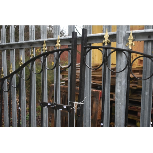 1003 - A PAIR OF WROUGHT IRON DRIVEWAY GATES, arched top, with gilt finials, overall width 454cm x each gat... 