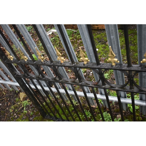 1003 - A PAIR OF WROUGHT IRON DRIVEWAY GATES, arched top, with gilt finials, overall width 454cm x each gat... 