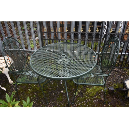 1004 - AN ALUMINIUM CIRCULAR GARDEN TABLE, diameter 97cm x height 69cm and two armchairs (condition report:... 