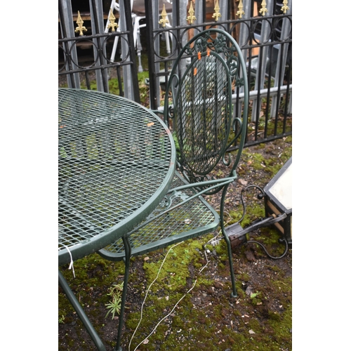 1004 - AN ALUMINIUM CIRCULAR GARDEN TABLE, diameter 97cm x height 69cm and two armchairs (condition report:... 