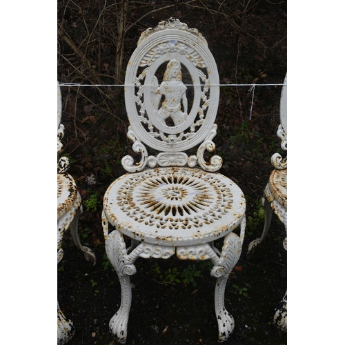 1005 - A SET OF FOUR WHITE PAINTED CAST IRON GARDEN CHAIRS, depicting a person to the oval back, over a cir... 