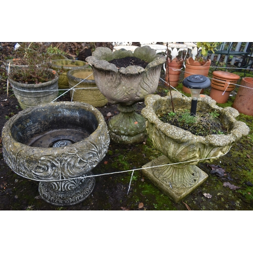 1010 - THREE SIMILAR WEATHERED ACANTHUS LEAF SHAPED CIRCULAR PLANTERS, largest planter diameter 50cm x heig... 