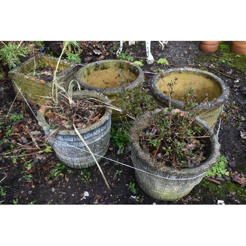 1011 - A PAIR OF WEATHERED COMPOSITE CIRCULAR PLANTERS, labelled Sandford stone, diameter 45cm x height 28c... 