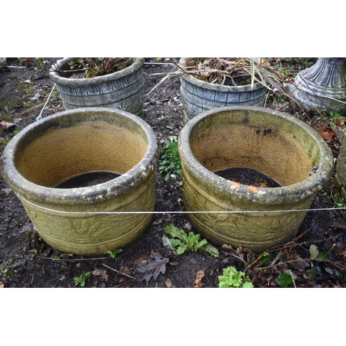 1011 - A PAIR OF WEATHERED COMPOSITE CIRCULAR PLANTERS, labelled Sandford stone, diameter 45cm x height 28c... 