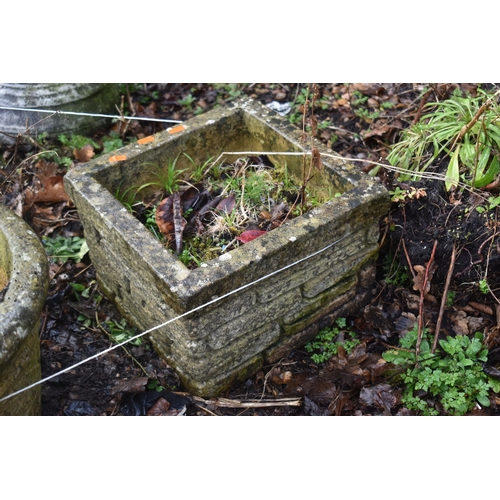 1011 - A PAIR OF WEATHERED COMPOSITE CIRCULAR PLANTERS, labelled Sandford stone, diameter 45cm x height 28c... 