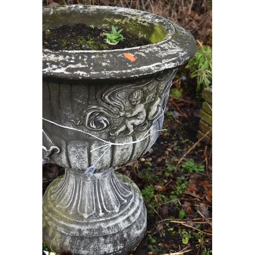 1012 - A LARGE WEATHERED COMPOSITE CAMPAGNA URN, diameter 57cm x height 62cm (condition report: no visible ... 