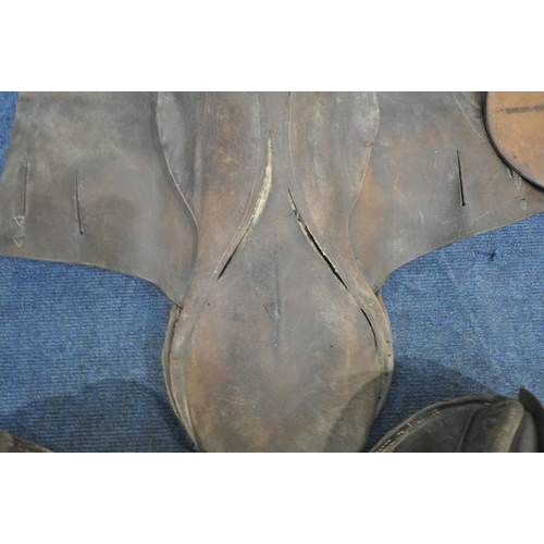 1258 - FOUR VARIOUS TANNED LEATHER SADDLES (condition report: marks, scuffs, wear and tear, other signs of ... 