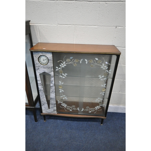 1271 - A MID CENTURY DISPLAY CABINET, fitted with a Smith's clock, the double glazed doors with foliate det... 