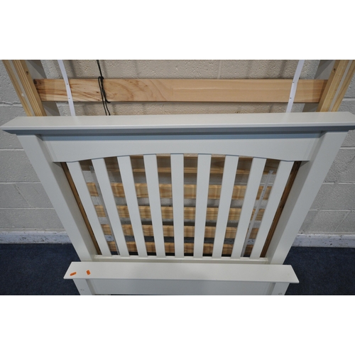 1284 - A MODERN WHITE PINE SINGLE BEDSTEAD, with side rails, slats and bolts (condition report: general sig... 