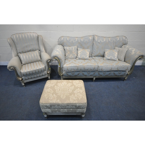 1285 - AN ITALIAN STYLE THREE PIECE LOUNGE SUITE, comprising a two seater sofa, with gold and foliate uphol... 