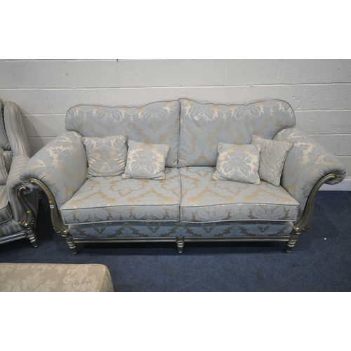 1285 - AN ITALIAN STYLE THREE PIECE LOUNGE SUITE, comprising a two seater sofa, with gold and foliate uphol... 