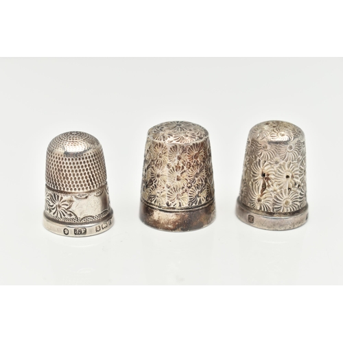 52 - THREE THIMBLES, the first a silver thimble hallmarked 'Henry Griffith & Sons Ltd' Birmingham, stampe... 