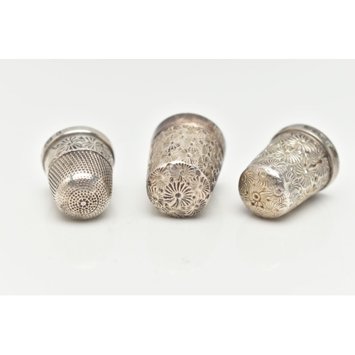 52 - THREE THIMBLES, the first a silver thimble hallmarked 'Henry Griffith & Sons Ltd' Birmingham, stampe... 