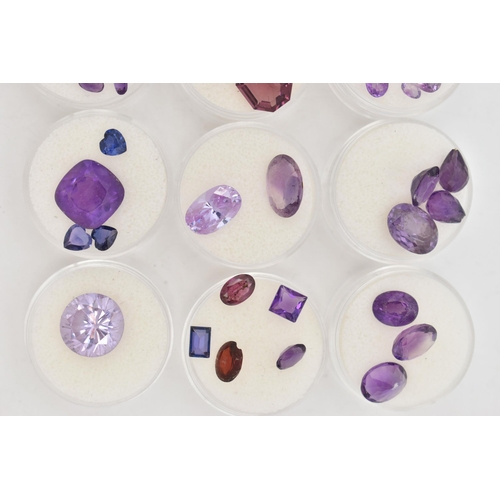 70 - A SELECTION OF LOOSE FACETED MAINLY PURPLE GEMSTONES, to include a large circular purple cubic zirco... 