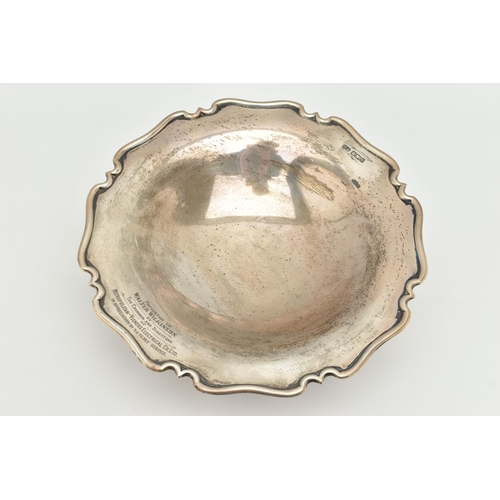 100 - AN ELIZABETH II SILVER PRESENTATION DISH, circular dish with wavy rim, engraved 'Presented to Walter... 