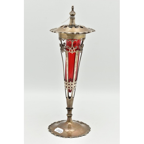 112 - AN EARLY 20TH CENTURY SILVER LIDDED VASE, the tapered trumpet shaped vase with pierced scrolling det... 