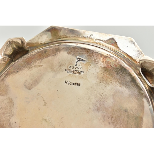 91 - A GEORGE V SILVER WAITER, octagonal form with shell detail, raised on four fish head feet, hallmarke... 