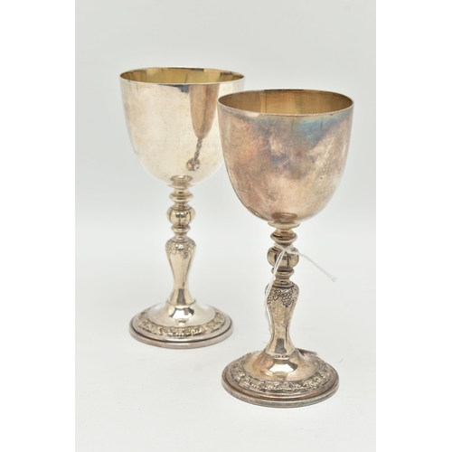 92 - A PAIR OF ELIZABETH II SILVER COMMEMORATIVE GOBLETS, polished cups with gilt interior, engraved 'EII... 