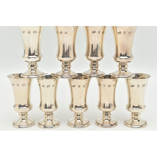 93 - A SET OF TWELVE SILVER LIQUOR/SHERRY CUPS, tapering on round based, gilt interiors, hallmarked 'A T ... 