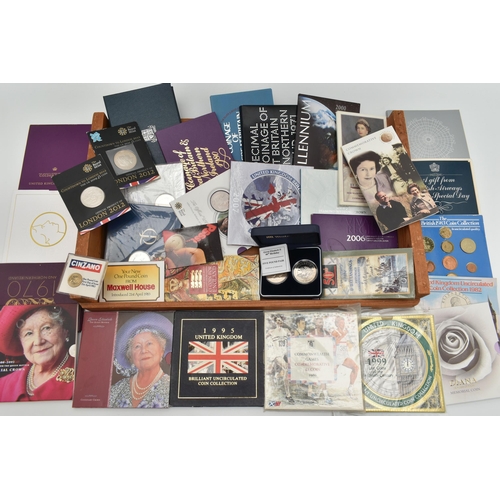 145 - A CARDBOARD BOX OF MAINLY ROYAL MINT UK COINAGE, to include The Last Proof coin set of 1970, Royal m... 