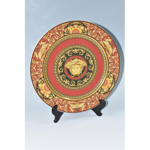 325 - A ROSENTHAL VERSACE MEDUSA PLATE, in red, black and yellow, with central Medusa mask, diameter 30.5c... 