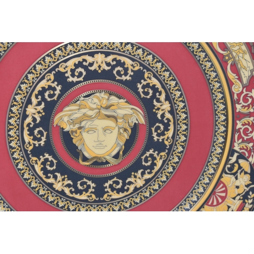 325 - A ROSENTHAL VERSACE MEDUSA PLATE, in red, black and yellow, with central Medusa mask, diameter 30.5c... 