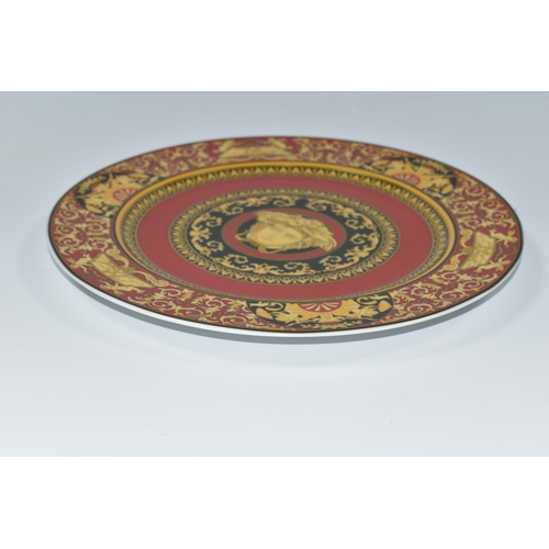 325 - A ROSENTHAL VERSACE MEDUSA PLATE, in red, black and yellow, with central Medusa mask, diameter 30.5c... 