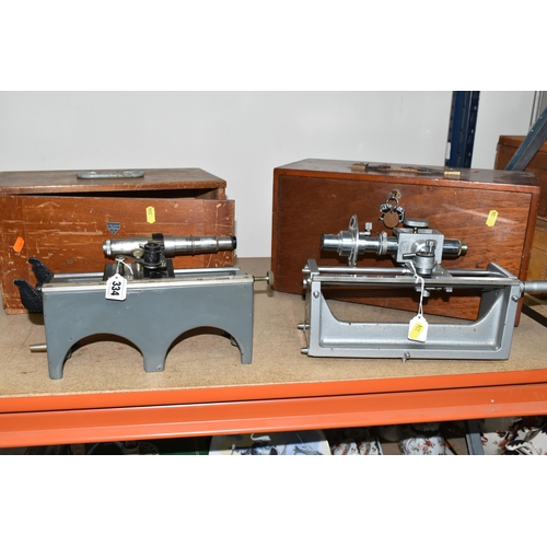 334 - TWO PRECISION OPTICAL MEASURING INSTRUMENTS, comprising a J. Swift & Son model 31287 with a micromet... 