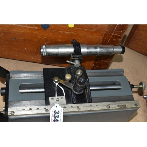 334 - TWO PRECISION OPTICAL MEASURING INSTRUMENTS, comprising a J. Swift & Son model 31287 with a micromet... 