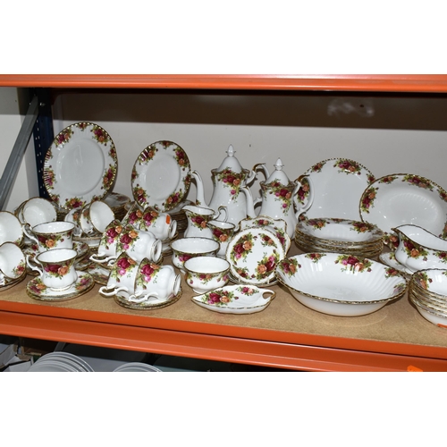 335 - A LARGE QUANTITY OF ROYAL ALBERT 'OLD COUNTRY ROSES' PATTERN DINNERWARE, comprising  a circular serv... 