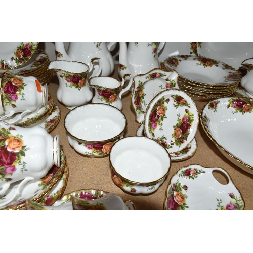 335 - A LARGE QUANTITY OF ROYAL ALBERT 'OLD COUNTRY ROSES' PATTERN DINNERWARE, comprising  a circular serv... 