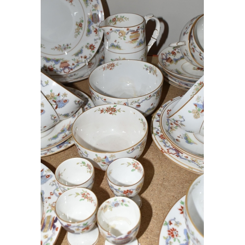 336 - A ROYAL WORCESTER BREAKFAST SET,  'Pekin' pattern W9757, comprising a covered crumpet dish, milk jug... 