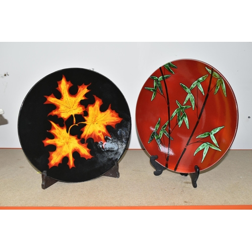 346 - TWO MODERN POOLE POTTERY CHARGERS, comprising an 'Autumn Leaves' charger, diameter 40.5cm and a  red... 