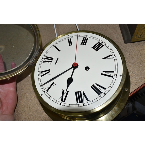 347 - A BRASS SHIP'S CLOCK AND A CLEPSYDRA, comprising an early 20th century circular brass ship's clock w... 