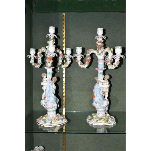 361 - A PAIR OF CONTINENTAL FOUR FLAME FIGURAL CANDELABRA, depicting a woman and child beside the central ... 