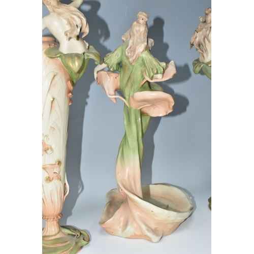 362 - A PAIR OF ART NOUVEAU AMPHORA AUSTRIA VASES AND AN AMPHORA CENTREPIECE, the elongated vases in cream... 