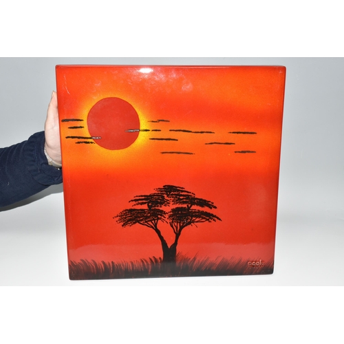 366 - A POOLE POTTERY 'AFRICAN SKY' WALL PANEL, depicting silhouetted tree and clouds on a red/orange grou... 