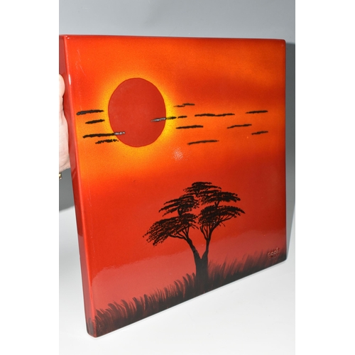 366 - A POOLE POTTERY 'AFRICAN SKY' WALL PANEL, depicting silhouetted tree and clouds on a red/orange grou... 