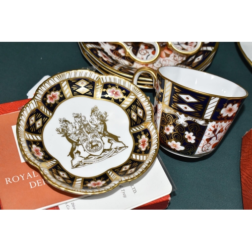 376 - A GROUP OF ROYAL CROWN DERBY IMARI 2451 TEA CUPS, SAUCERS AND A TRINKET DISH, comprising a boxed lim... 