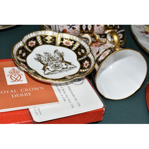 376 - A GROUP OF ROYAL CROWN DERBY IMARI 2451 TEA CUPS, SAUCERS AND A TRINKET DISH, comprising a boxed lim... 